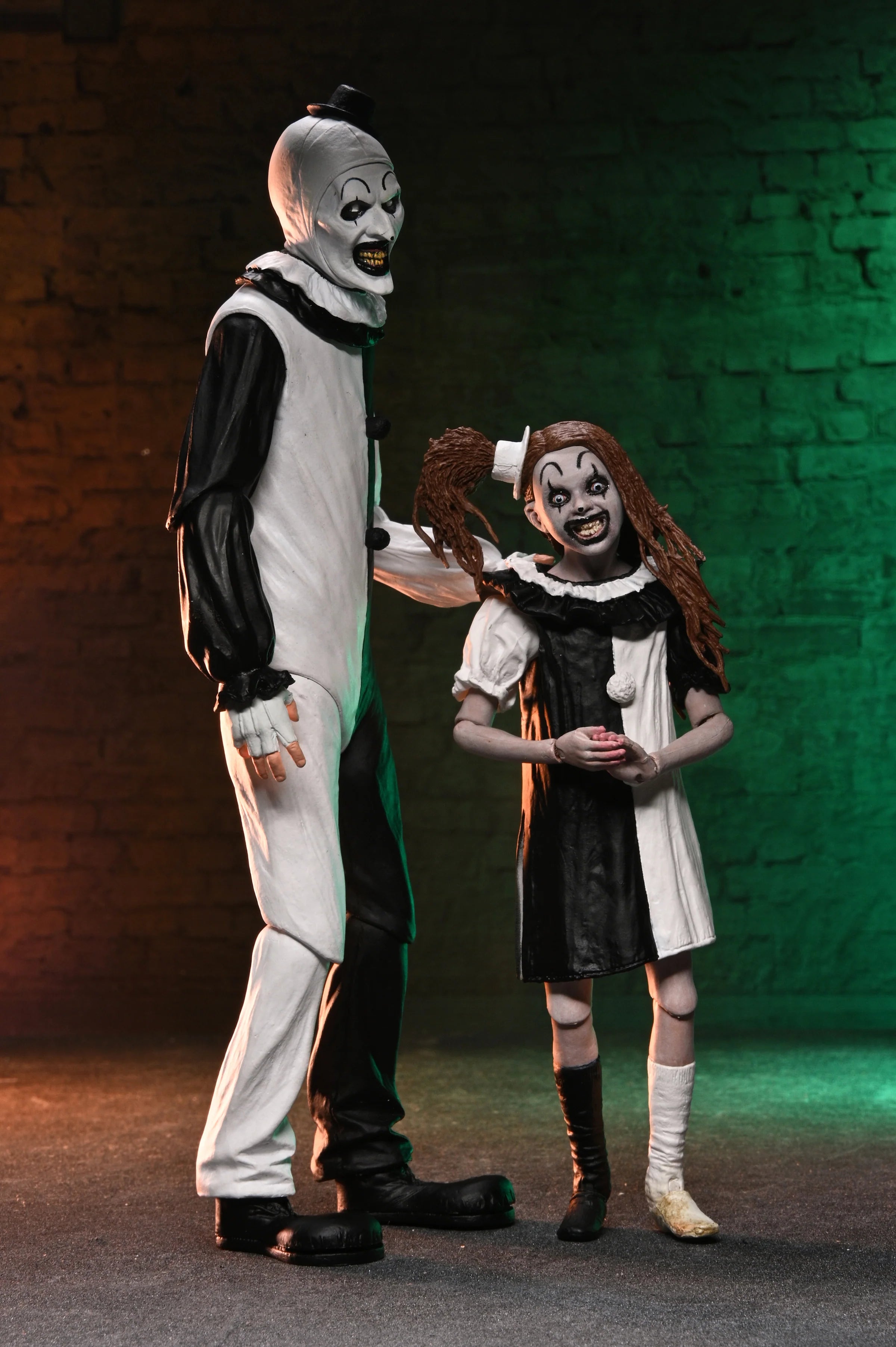 NECA - Terrifier 2 - Ultimate Art the Clown & The Little Pale Girl 7" Scale Action Figure 2-Pack (Pre-Order Ships September 2026)