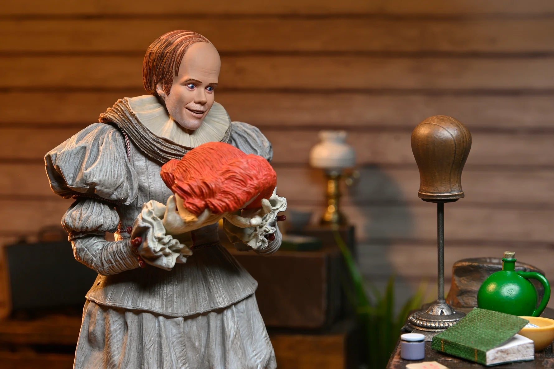 NECA - IT: Welcome to Derry - Ultimate Bob Gray as Pennywise 7" Scale Action Figure (Pre-Order Ships April 2026)
