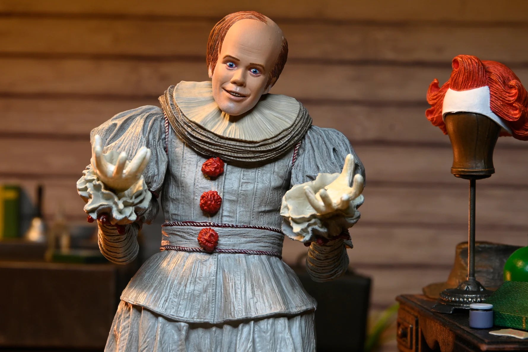 NECA - IT: Welcome to Derry - Ultimate Bob Gray as Pennywise 7" Scale Action Figure (Pre-Order Ships April 2026)