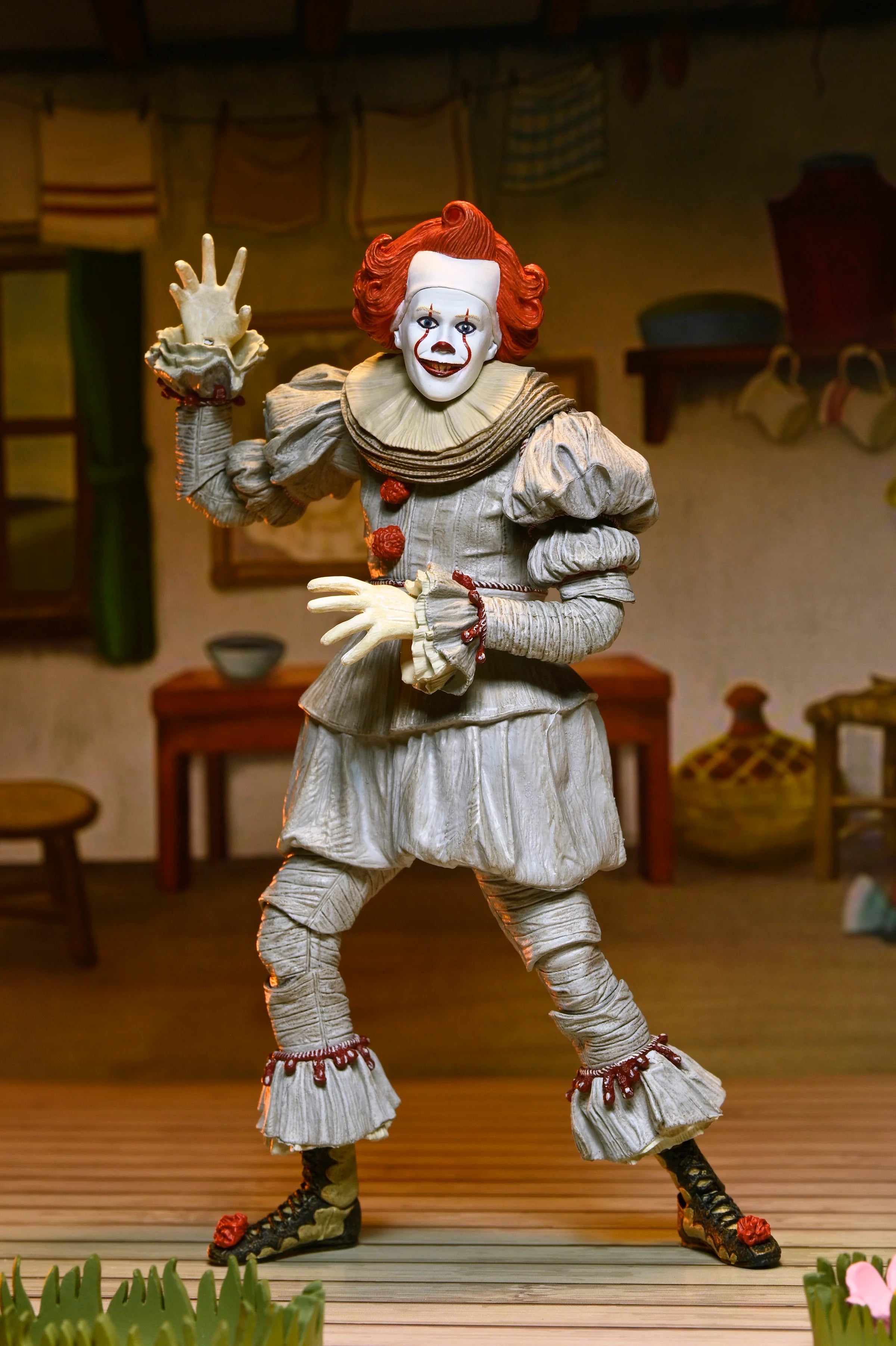 NECA - IT: Welcome to Derry - Ultimate Bob Gray as Pennywise 7" Scale Action Figure (Pre-Order Ships April 2026)