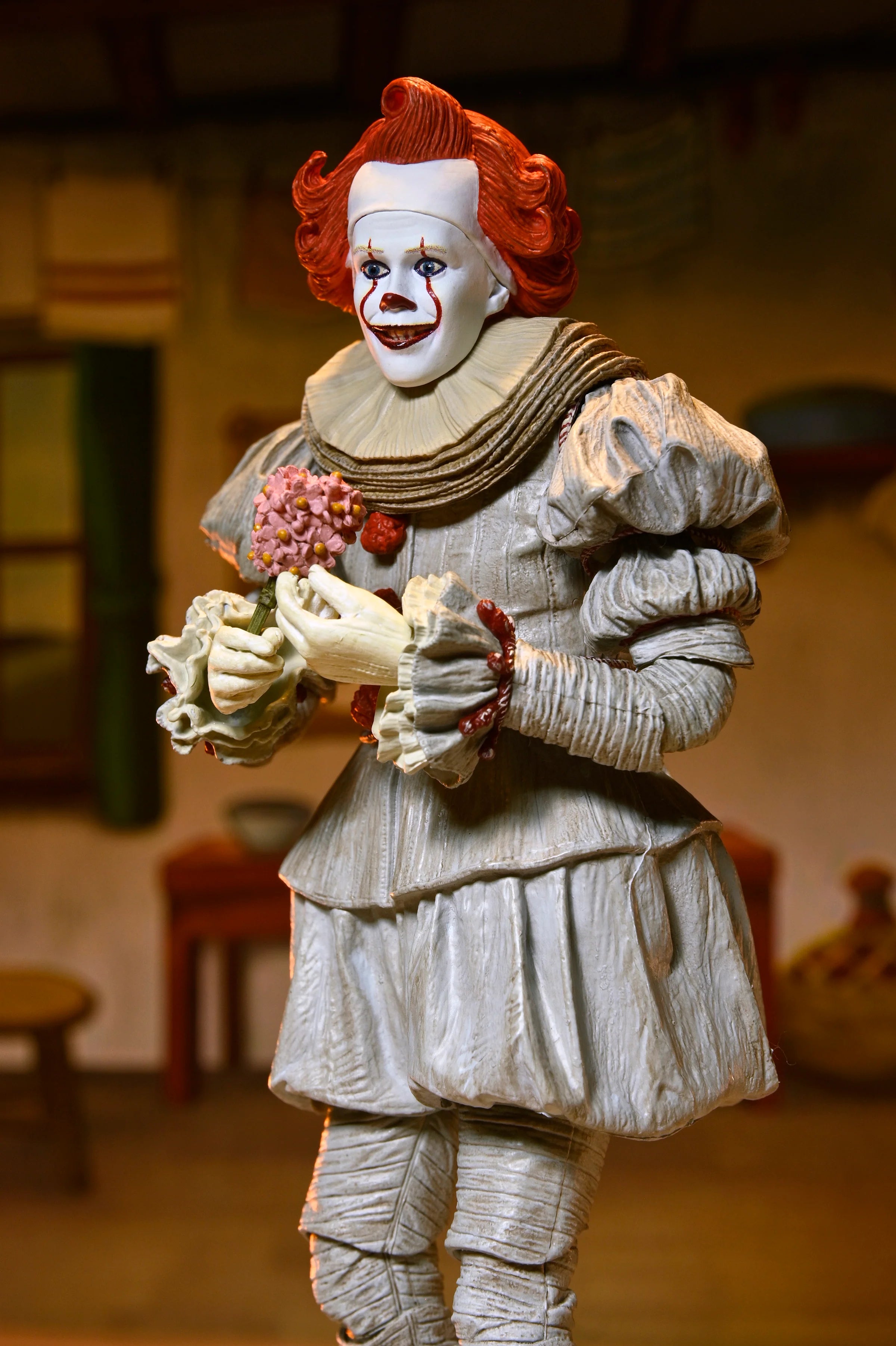 NECA - IT: Welcome to Derry - Ultimate Bob Gray as Pennywise 7" Scale Action Figure (Pre-Order Ships April 2026)