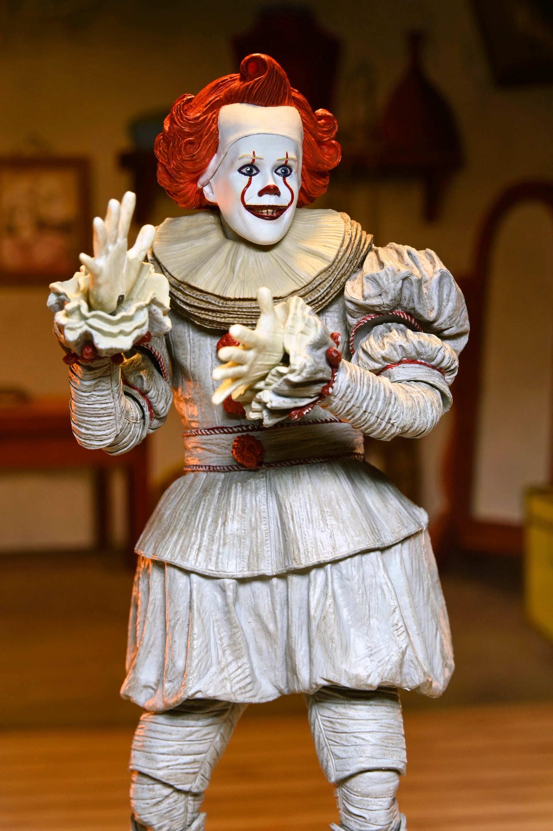 NECA - IT: Welcome to Derry - Ultimate Bob Gray as Pennywise 7" Scale Action Figure (Pre-Order Ships April 2026)