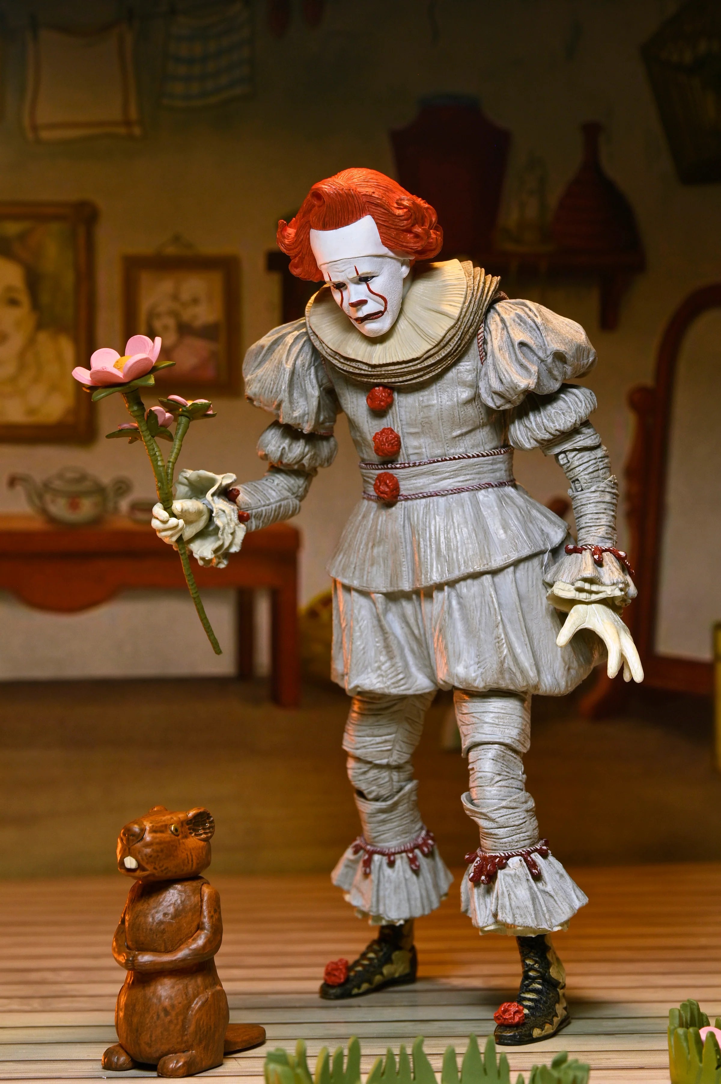 NECA - IT: Welcome to Derry - Ultimate Bob Gray as Pennywise 7" Scale Action Figure (Pre-Order Ships April 2026)