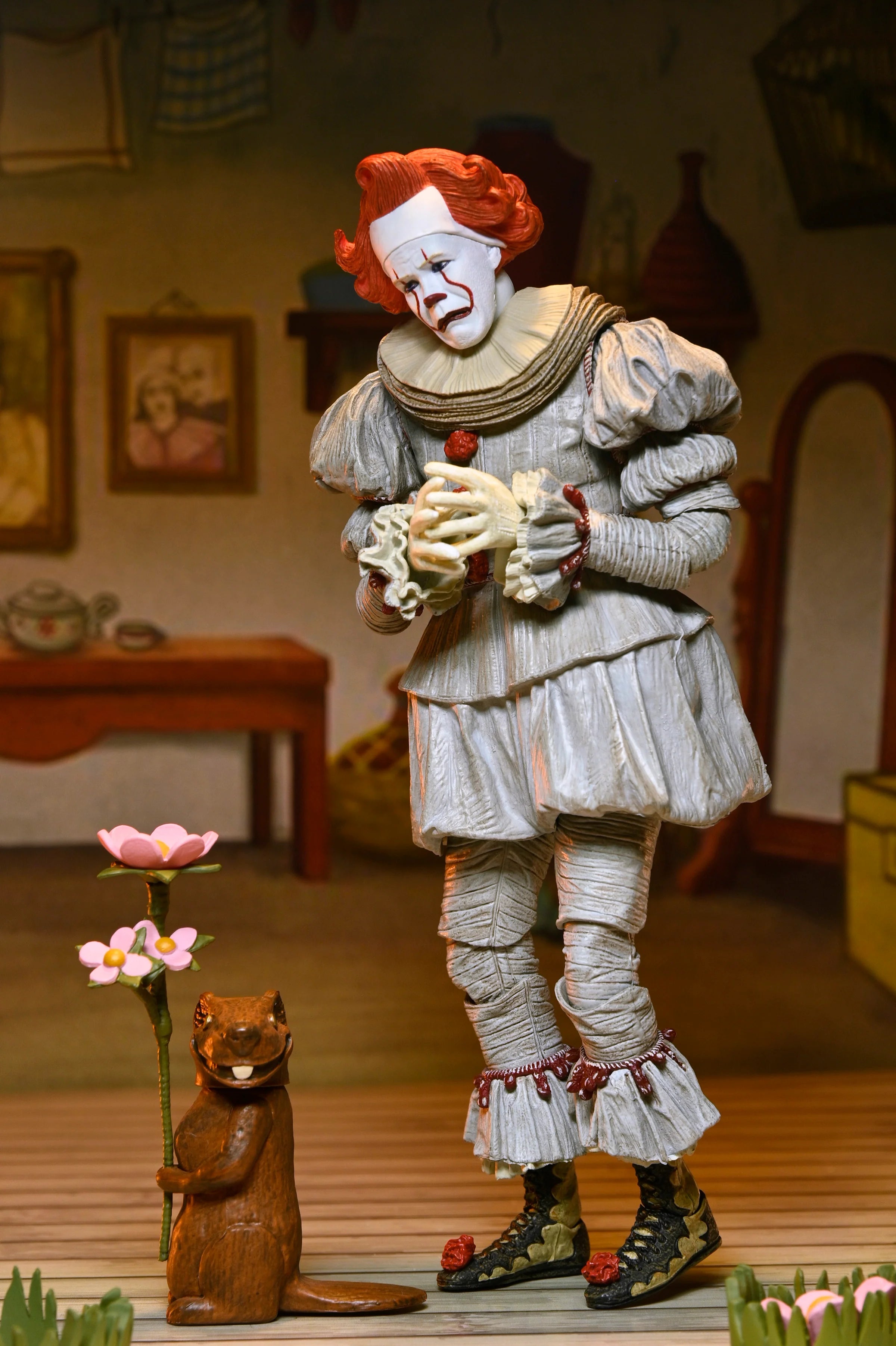 NECA - IT: Welcome to Derry - Ultimate Bob Gray as Pennywise 7" Scale Action Figure (Pre-Order Ships April 2026)
